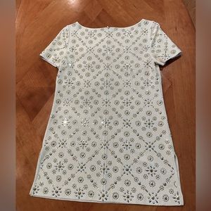 St.John Couture tunic. Never been worn. Silver and gold embellishment.